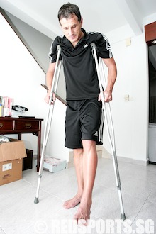 Aleks on crutches