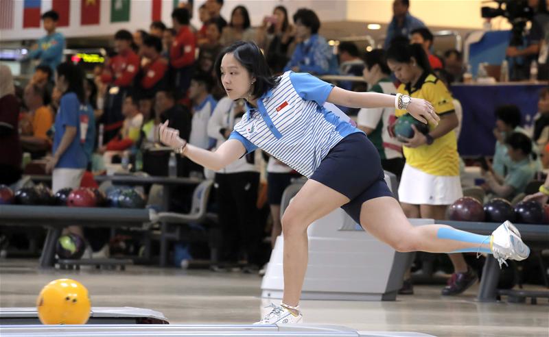 Jazreel Tan in action during the women's singles event and en route to winning silver. (Photo 7 courtesy of Vivek Prakash / Sport Singapore via Action Images Livepic)