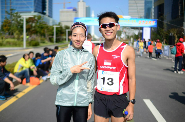 Colin with the top female finisher in the half marathon. (Photo 5 courtesy of Jezreel Mok)