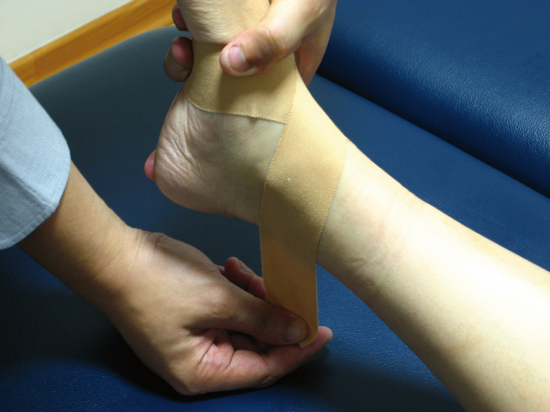 sports taping of ankle
