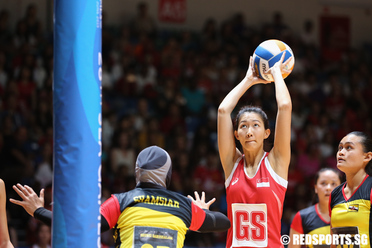 Charmaine Soh (C) of Singapore shoots against Burnei. (Photo © Lee Jian Wei/Red Sports)