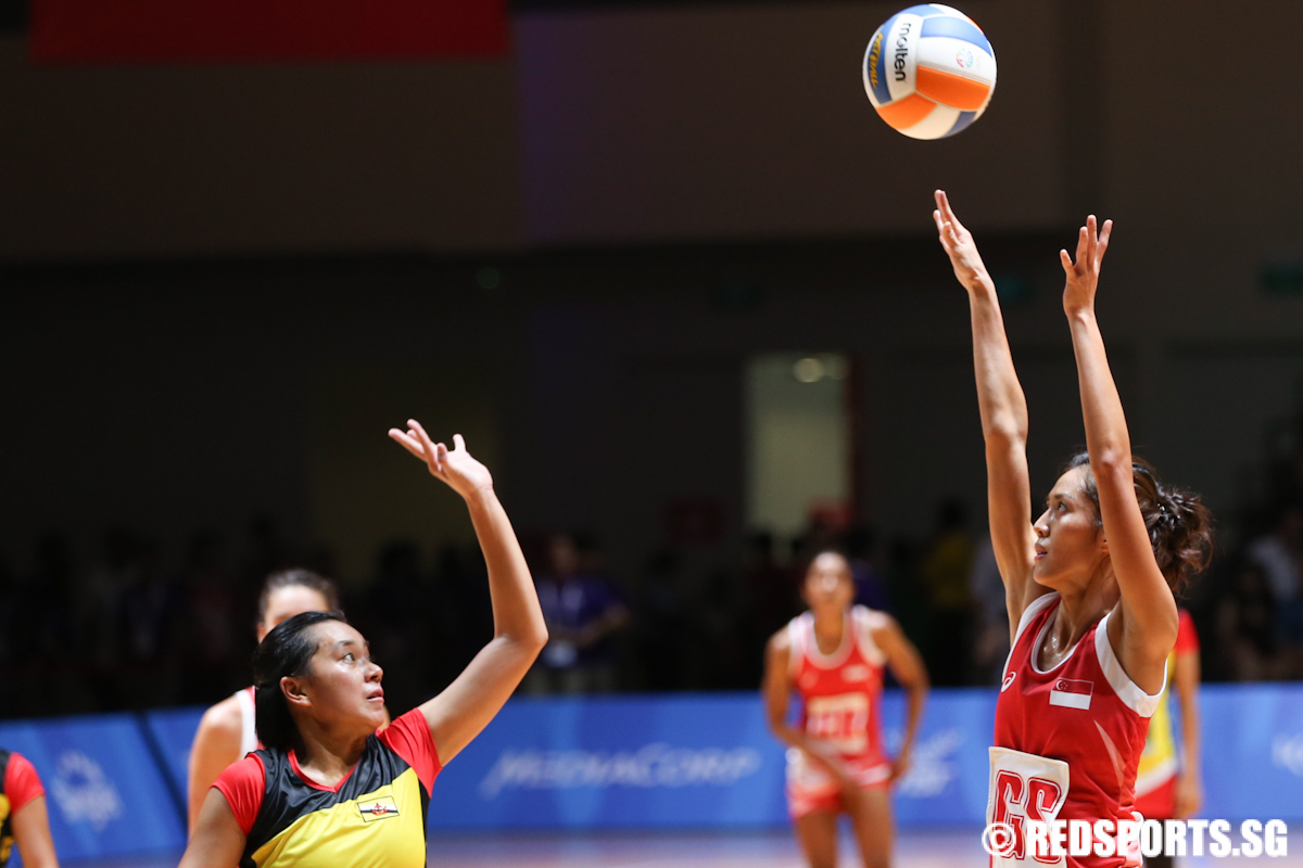 Yasmin Ho (GS) of Singapore takes a shot against Brunei. (Photo © Lee Jian Wei/Red Sports)