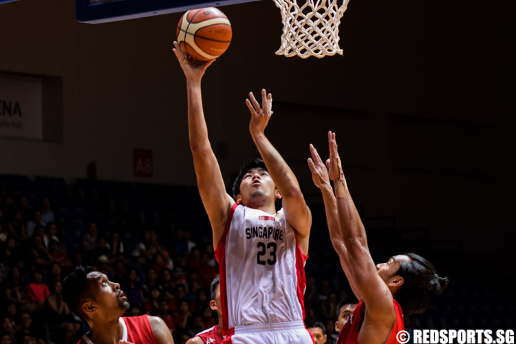 Delvin Goh (SIN #23) brings the ball to the hoop. (Photo 1 © Laura Lee/Red Sports)