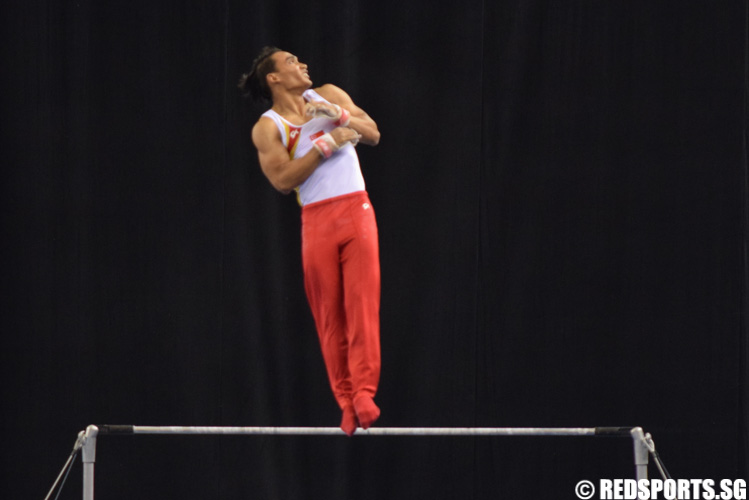 Aizat Muhammad Jufrie executing his dismount. (Photo 3 © Laura Lee/Red Sports)