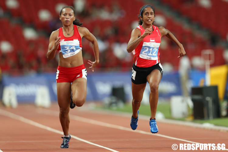 Veronica Shanti Pereira (#212) of Singapore in action. She clinched the bronze medal with a time of 11.88 seconds. (Photo © Lee Jian Wei/Red Sports)