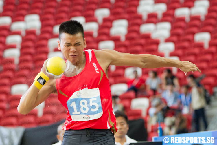 Lance Tan (#185) of Singapore in action during the shot put event of the Men's Decathlon. (Photo © Lee Jian Wei/Red Sports)