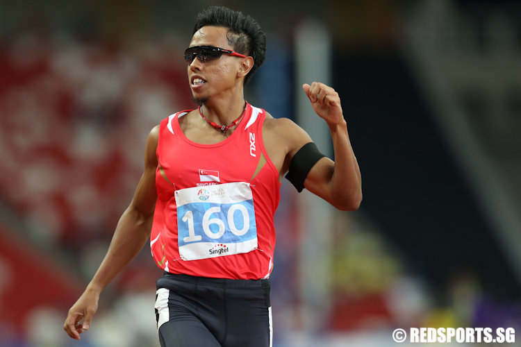 Amirudin Jamal (#160) of Singapore clocked a time of 10.55 seconds to finish sixth in the Men's 100m finals. (Photo © Lee Jian Wei/Red Sports)