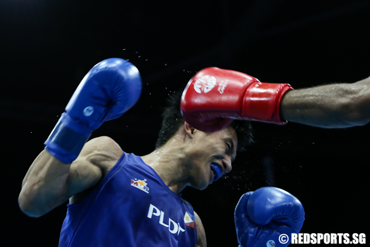 Ian Clark Bautista (Blue) of Philippines beat Hanurdeen Hamid (Red) of Singapore  2–1 in the Men's Flyweight (52kg) Finals. (Photo © Lee Jian Wei/Red Sports)
