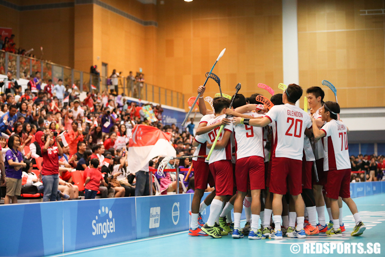 Team Singapore celebrates after scoring a goal against Thailand. Singapore beat Thailand 9–0 to clinch the gold medal in the finals. (Photo © Lee Jian Wei/Red Sports)