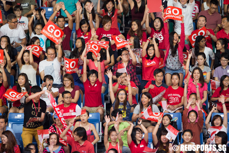 Singapore fans on their feet as Singapore held off Malaysia in an extremely entertaining encounter to win the netball gold.  (Photo © Lee Jian Wei/Red Sports)