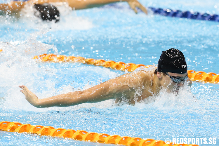 Joseph Schooling of Singapore in action during the men's 100m butterfly finals. He clocked a time of 52.13s to clinch the gold medal and sets a new game record. (Photo © Lee Jian Wei/Red Sports)