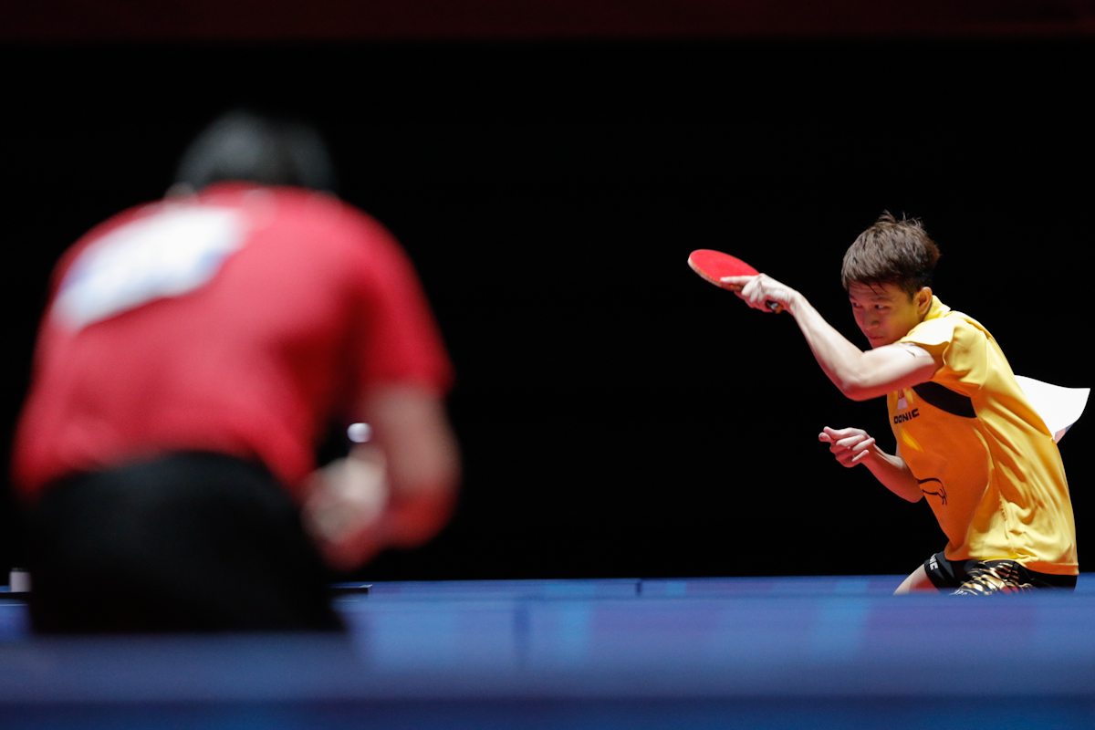 Gao Ning (L) and Clarence Chew (R) of Singapore in action. (Photo © Lee Jian Wei/Red Sports)