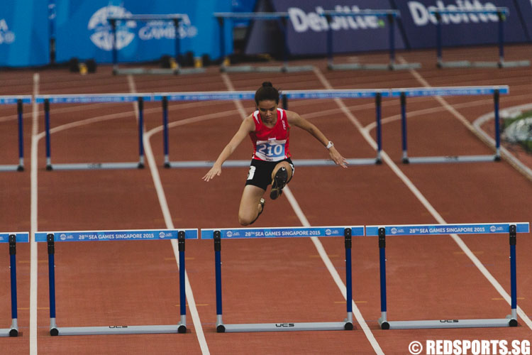 Ng Jia Yi (SIN) clearing a hurdle in the Womens 400m Hurdle final. (Photo 2 © Soh Jun Wei/Red Sports)