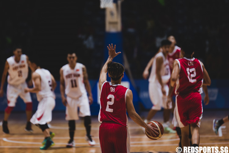Desmond Oh (SIN #2) calls a play for the Singapore team during their possession. (Photo 10 © Soh Jun Wei/Red Sports)