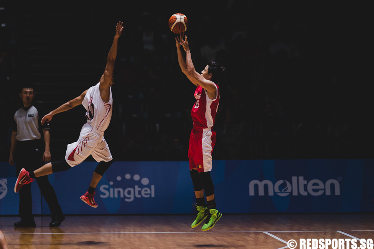 Tan Chin Hong (SIN #83) pulls up for the jumper near the baseline. (Photo 11 © Soh Jun Wei/Red Sports)