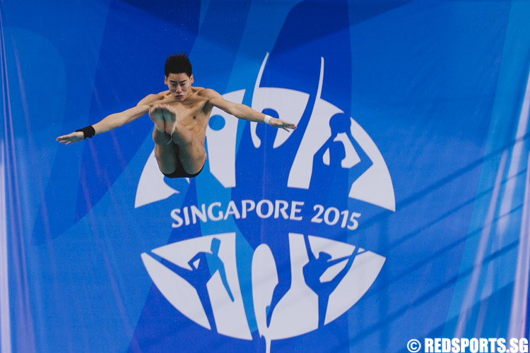 Jonathan Chan attempting his dive in round 1 of 6 at the Men's 10m Platform Diving finals. He clinched bronze with a total score of 356.55. (Photo 4 © Soh Jun Wei/Red Sports)