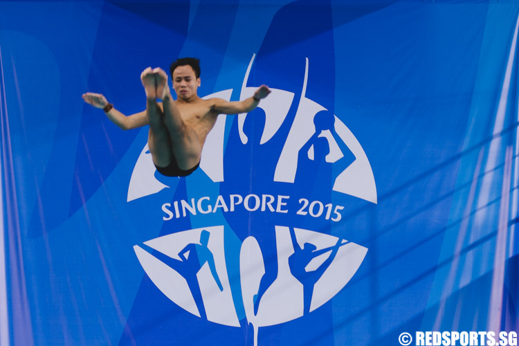 Chew Yi Wei (MAS) attempting his dive at the Men's 10m Platform Diving finals. He clinched silver with a total score of 393.65. (Photo 6 © Soh Jun Wei/Red Sports)