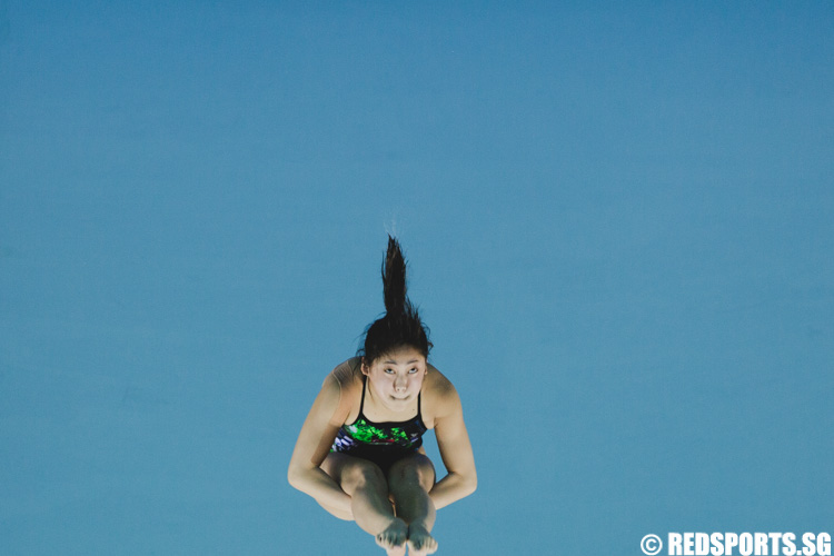 Freida Lim (SIN) attempting her dive. She clinched bronze with a score of 251.70. (Photo 1 © Soh Jun Wei/Red Sports)