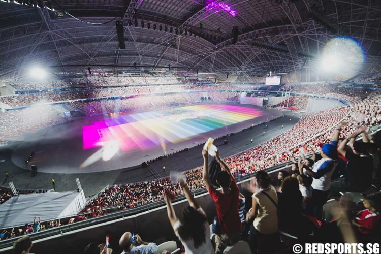 The audience doing a Kallang Wave at the start of the opening ceremony of the 28th Southeast Asian Games. (Photo 19 © Soh Jun Wei/Red Sports)