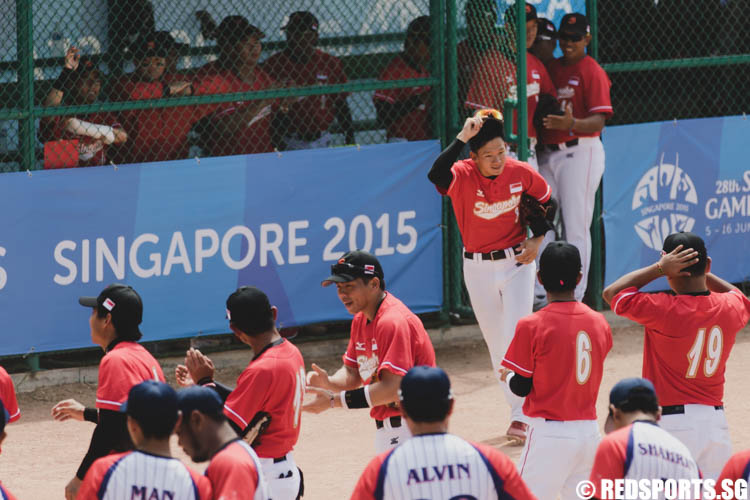 Benjamin Oh Zhi Yong (SIN #8) entering the diamond during the pre-game line-up. (Photo 6 © Soh Jun Wei/Red Sports)