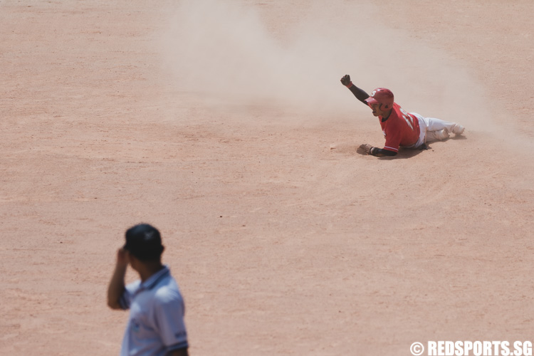 Kenny Goh Keng Ngee (SIN #12) slides into 2nd base. (Photo 7 © Soh Jun Wei/Red Sports)