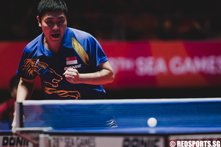 Gao Ning gains a point after his Vietnamese opponent fails to return the ball. (Photo 2 © Soh Jun Wei/Red Sports) 