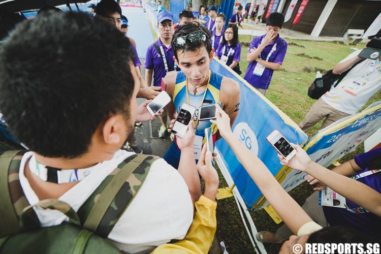 Gold Medalist for the 28th Southeast Asian (SEA) Games Men's Triathlon, Nikko Bryan Huelgas (PHI) doing his interview with the media. (Photo 12 © Soh Jun Wei/Red Sports)