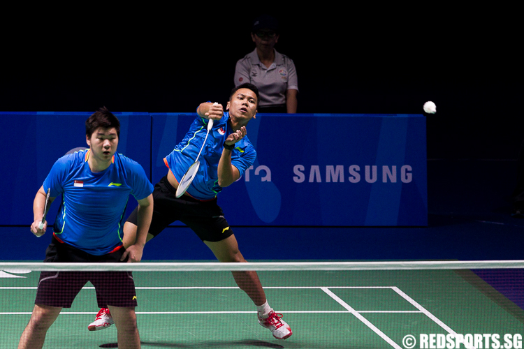Danny Chrisnanta and Chayut Triyachart of Singapore in the men's doubles game aginst Aniloud Keophithoun and Phakornkham Fongmalayseng of Laos.