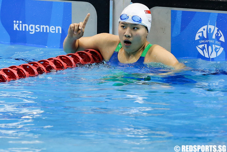 Tao Li celebrating after winning the gold medal in the 100m backstroke. (Photo 20 © Matthew Lau/Red Sports)