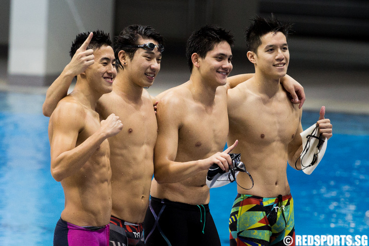 Quah Zheng Wen, Clement Lim, Joseph Schooling and Danny Yeo set a new Games record of 3:19.59 in the men's 4x100m freestyle relay. (Photo 1 © Matthew Lau/Red Sports)