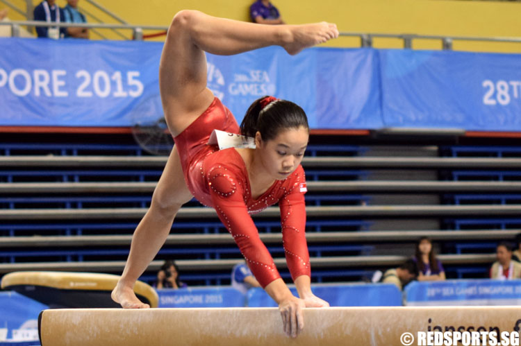 Ashley Lau posing at the beginning of her routine. (Photo 2 © Laura Lee/Red Sports)