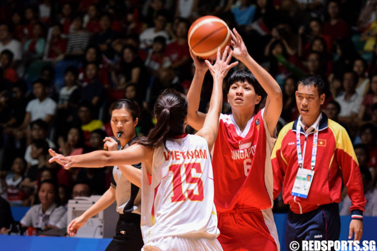 Lim Jia Min (SIN #6) shoots a three-pointer. Jia Min contributed 14 points to her team's win over Vietnam. (Photo 3 © Laura Lee/Red Sports)