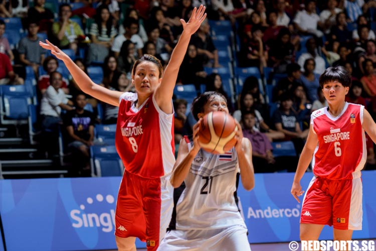 Jayne Tan (SIN #8) attempts to block a shot from Janthabut (THA #21). (Photo 4 © Laura Lee/Red Sports)