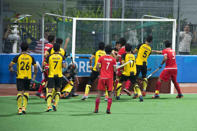 Singapore’s second goal sends the match into a penalty shoot out and its supporters into a frenzy.
