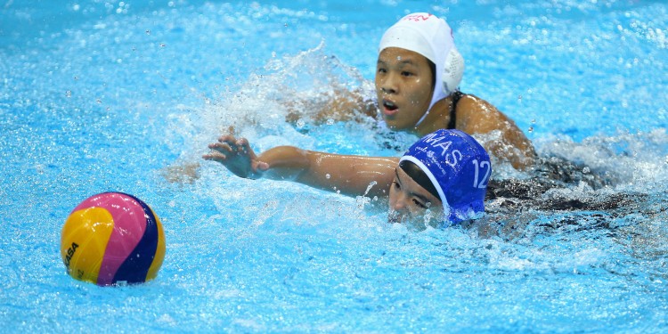 28th SEA Games Singapore 2015 - OCBC Aquatic Centre, Singapore - 12/6/15  Water Polo - Women's Round Robin - Malaysia's Cheryl Khoo Minn Jee and Singapore's Loke En Yuan in action SEAGAMES28 TEAMSINGAPORE Mandatory Credit: Singapore SEA Games Organising Committee / Action Images via Reuters