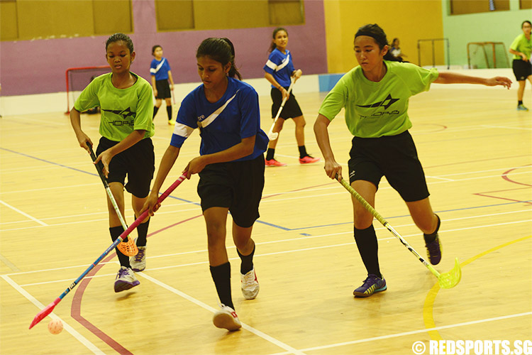 Nurul Syafiqah Bte Abdullah (#18) controls the ball against Springfield. She was the top scorer with 10 goals during the game. (Photo 1 © Louisa Goh/Red Sports)