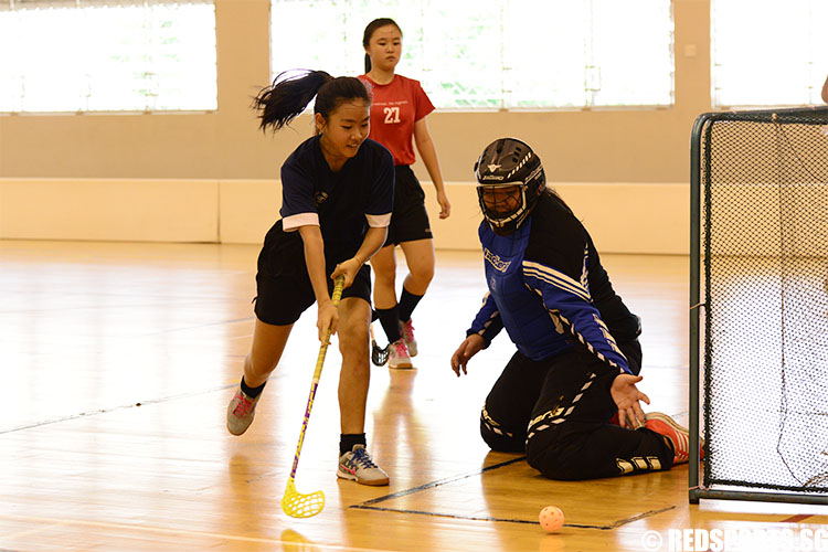 Megan Wah (BM #8) reaches out in an attempt to score. (Photo 4 © Louisa Goh/Red Sports)