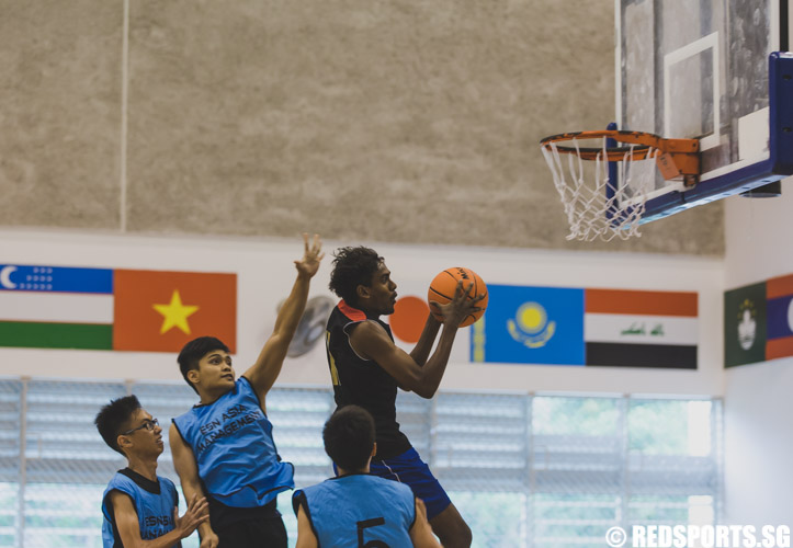 Vignesh Rengarajan of SKC in action during the U-17 boys' 3 x 3 basketball competition of the Singapore Youth Olympic Festival. (Photo 19 © Soh Jun Wei/Red Sports)