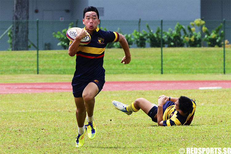Jared Tang (ACJC #13) makes a break and goes over for a try. (Photo 2 © Louisa Goh/Red Sports)