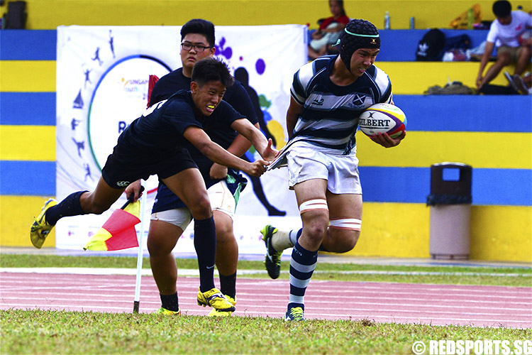Shawn Goh (RI #26) tries to take down his opponent. (Photo 6 © Louisa Goh/Red Sports) N.B. If you know the name of the SA player, please tell us in the comments section and we’ll update the caption. Thanks.