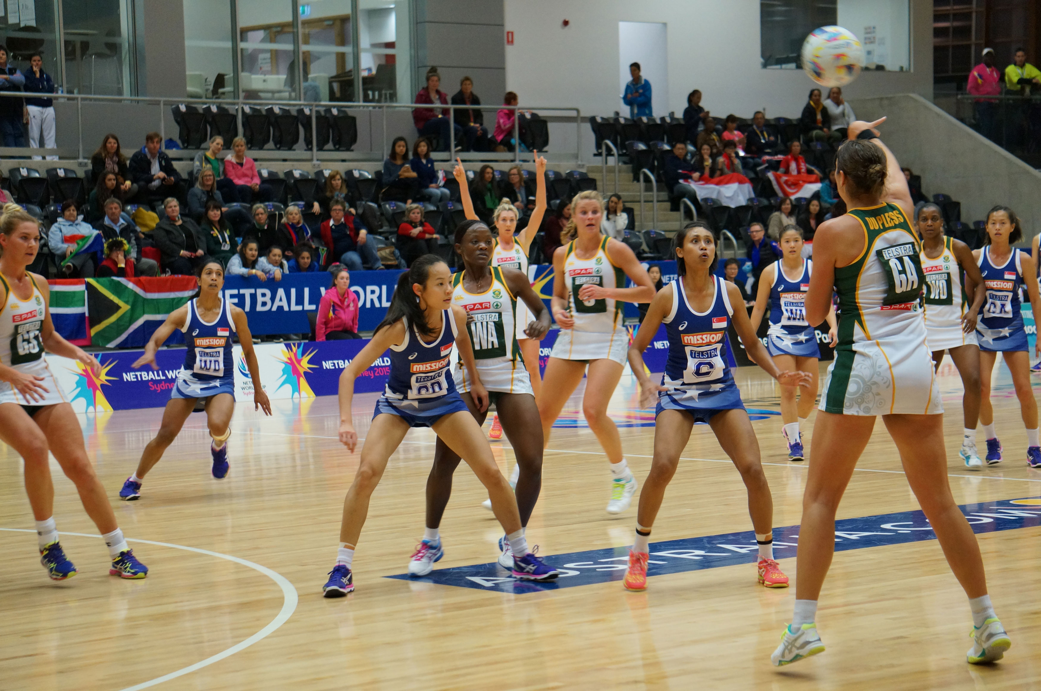 Micky Lin and Baizura of Singapore defend against South Africa. (Photo 2 courtesy of Netball Singapore)