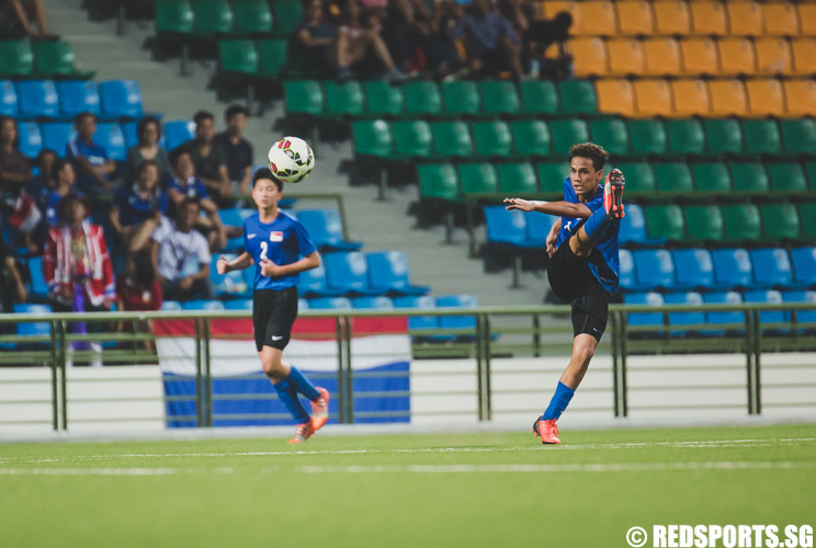 Irfan Jeferee (SIN #12) attempts a free kick during the 2016 Asian Football Confederation (AFC) U-16 Championship Qualifiers. (Photo 9 © Soh Jun Wei/Red Sports)