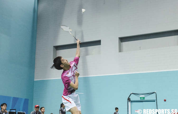 Jovenn Siow (SIN) returns the shuttlecock during the badminton Group B men's singles match one of the 8th ASEA Para Games. (Photo 8 © Soh Jun Wei/Red Sports)