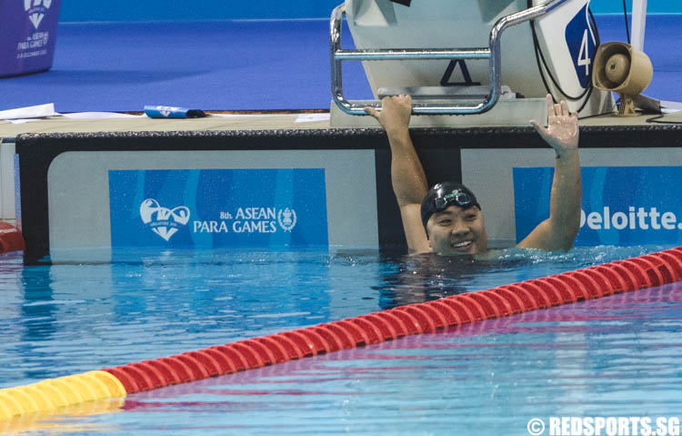 Theresa Goh (SIN) thanking her supporters during the Women's 200m Freestyle timed final at the 8th ASEAN Para Games (Photo 5 © Soh Jun Wei/Red Sports)
