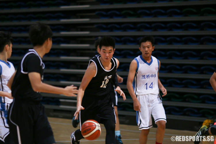 Howard (KR #12) driving to the hoop. He had a game-high 16 points in the victory. (Photo 1 © REDintern Chua Kai Yun)