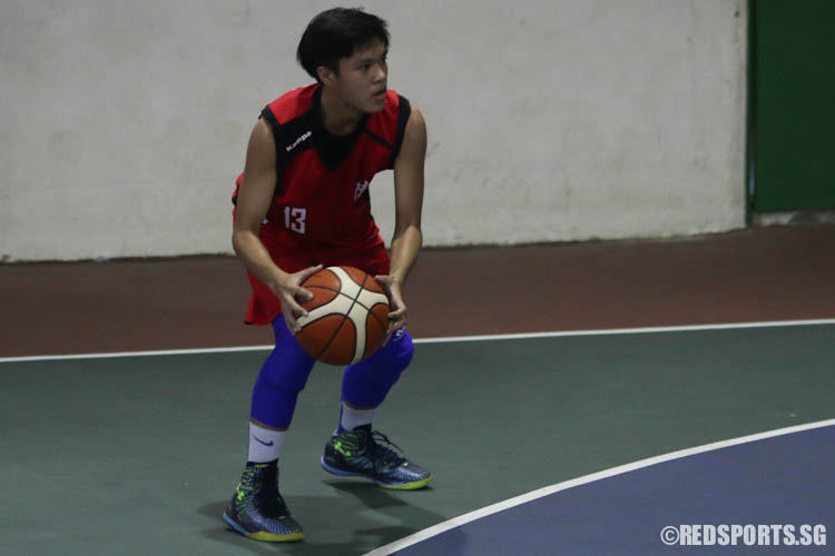 Nigel Tan Qing Xiang (Dunman #13) aims for a 3-pointer. (Photo 5 © REDintern Chua Kai Yun)