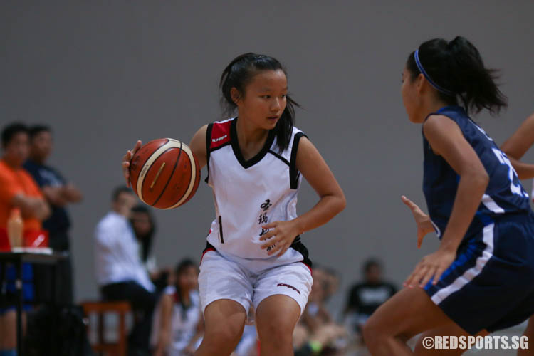 Xiao Chengxin (St Margarets’ #11) dribbles as she waits for open teammates. She had a team-high 10 points. (Photo 2 © REDintern Chua Kai Yun)
