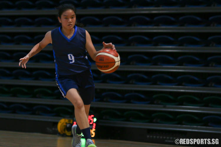 Claire Tay (CHIJ #9) driving into the hoop on a fast break. (Photo 4 © REDintern Chua Kai Yun)