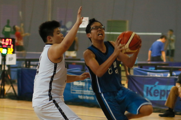 Linus (Bukit Panjang #8) driving for a layup. Linus scored a team high 11 points in the game.