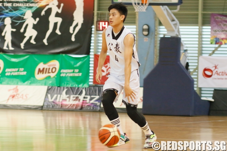 Kai Xuan (CHS #4) surveys the court on offence. He finished with a team-high 11 points in the victory. (Photo  © REDintern Dylan Chua)